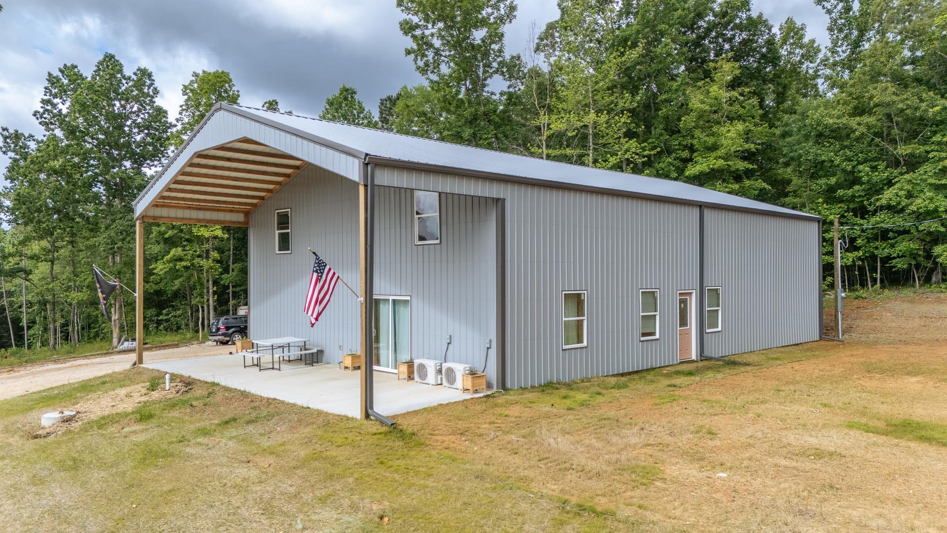 597 Hardin Graveyard Road Adamsville, TN 38310 - Photo 1 of 40 a backyard of a house