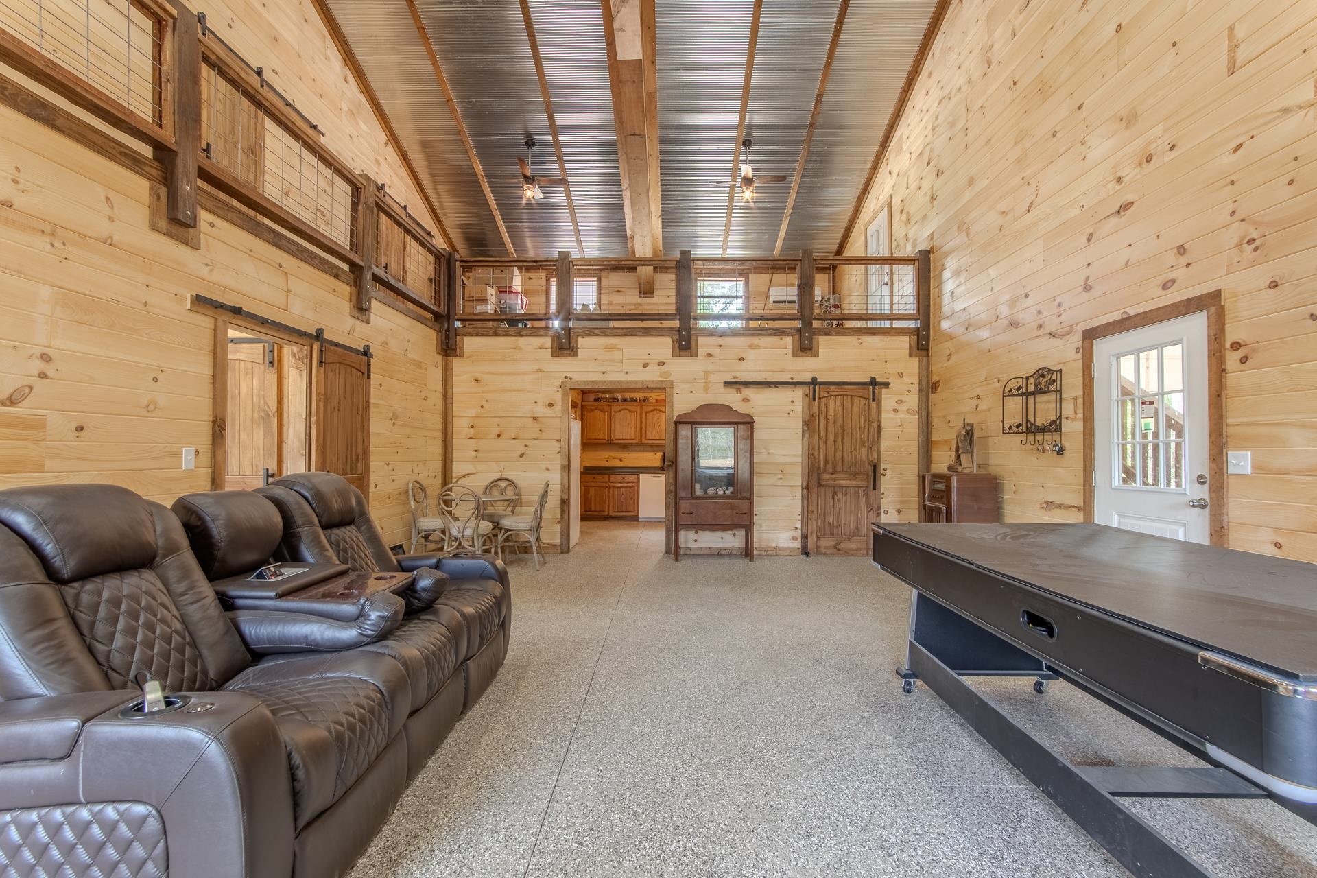 597 Hardin Graveyard Road Adamsville, TN 38310 - Photo 11 of 40 a living room with furniture and a fireplace