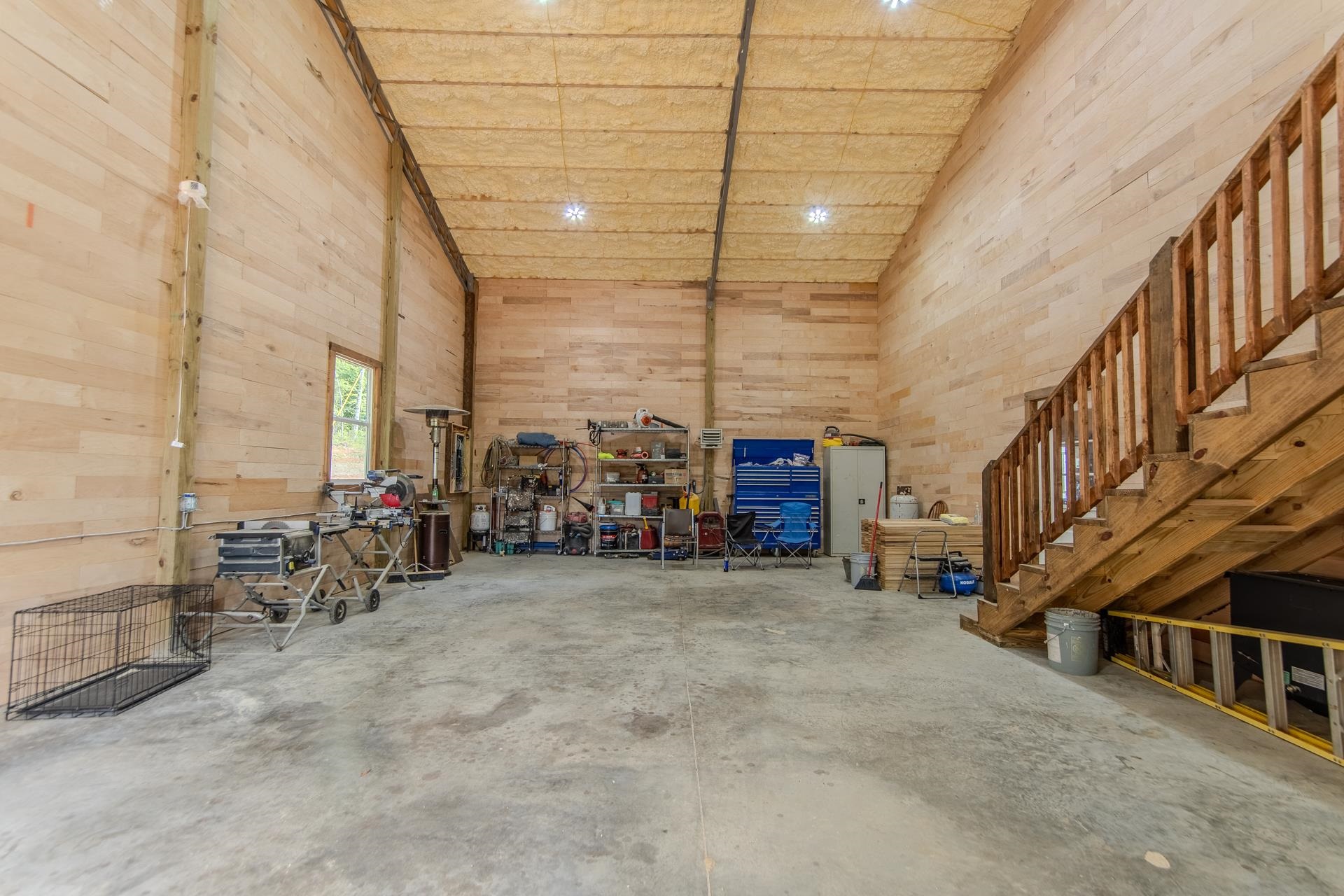 597 Hardin Graveyard Road Adamsville, TN 38310 - Photo 25 of 40 a view of a garage with parked cars