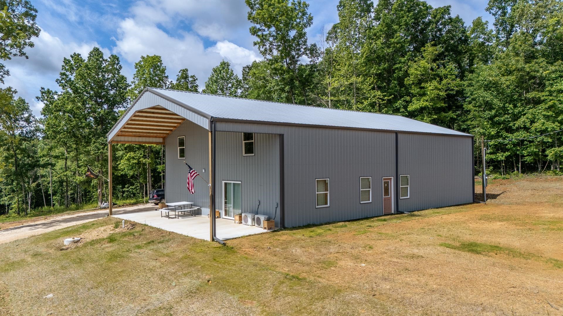 597 Hardin Graveyard Road Adamsville, TN 38310 - Photo 7 of 40 a backyard of a house