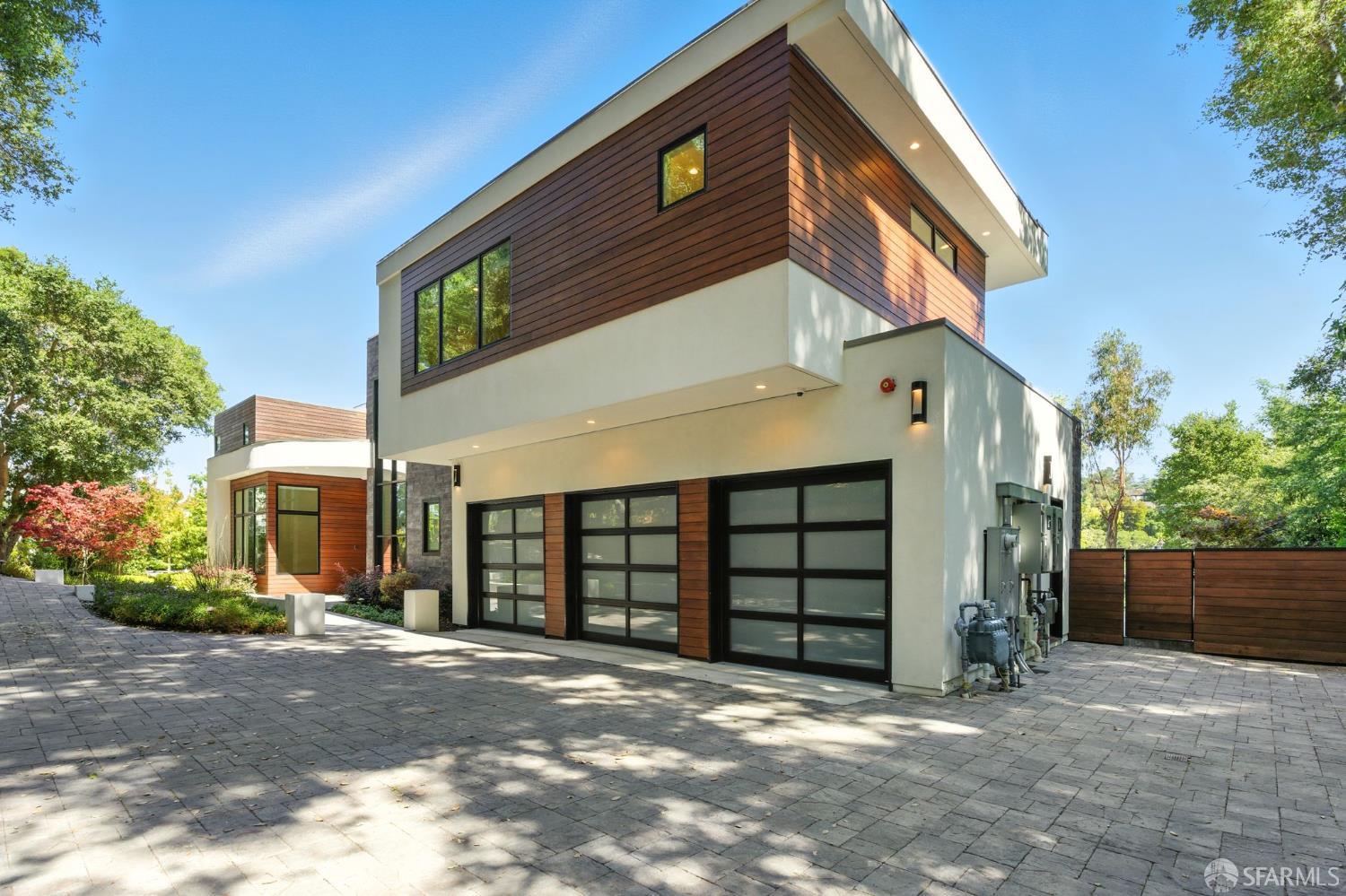 a front view of a house with a garage