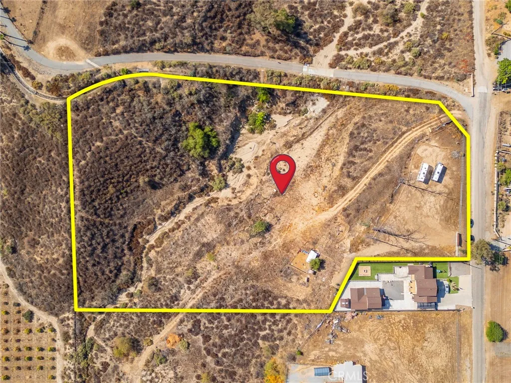 0 Grant Hemet, CA 92544 - Photo 2 of 9 a view of swimming pool with a garden