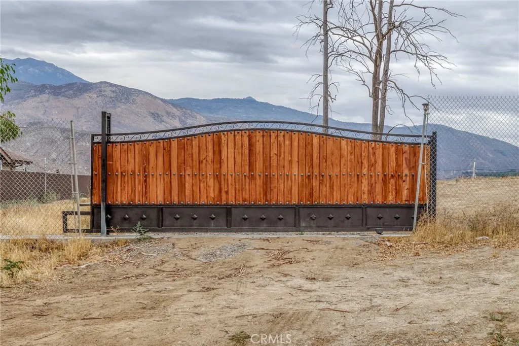 0 Grant Hemet, CA 92544 - Photo 9 of 9 a view of large yard with a wooden fence
