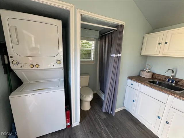 a utility room with dryer and washer