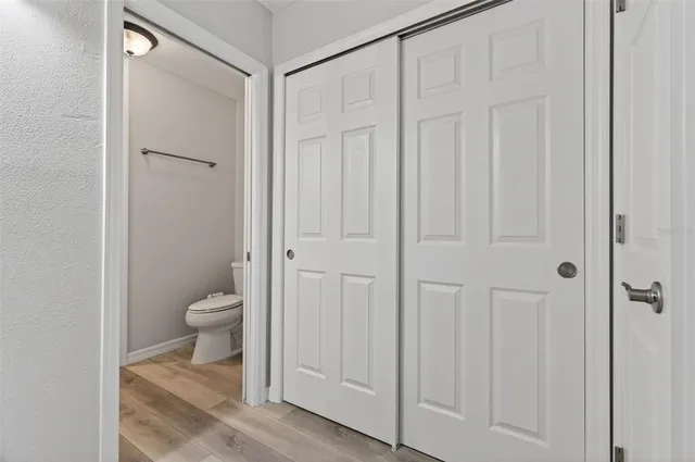 a bathroom with a toilet a sink