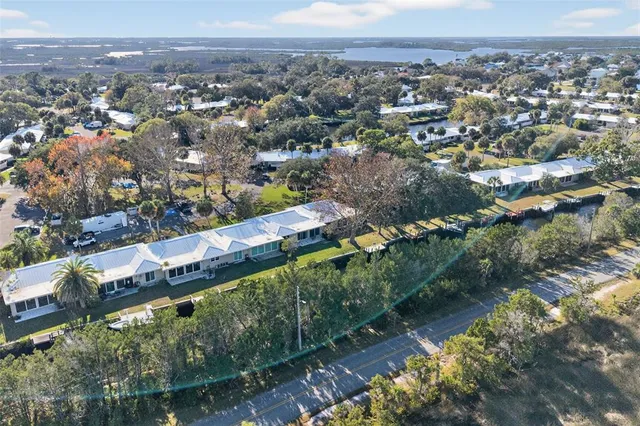 an aerial view of a city with mountains