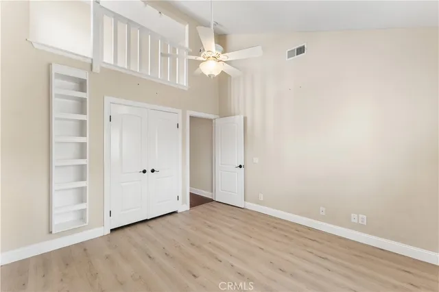 a bathroom with a granite countertop sink toilet a mirror and shower