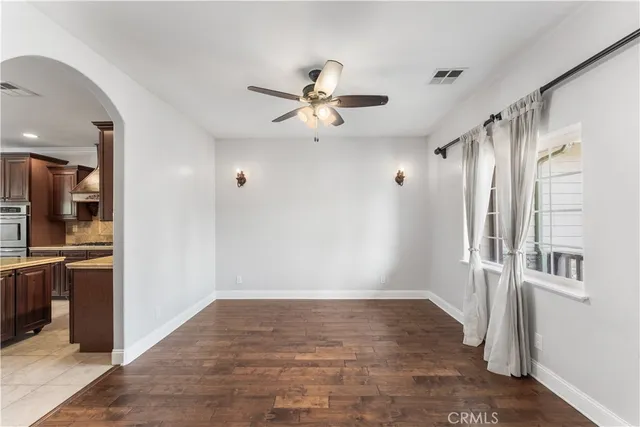 a view of a hallway with a kitchen