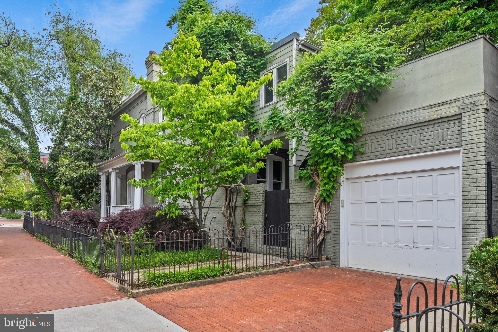 400 7th Street Southeast Washington, DC 20003 - Photo 1 of 23 front view of a house with a garden
