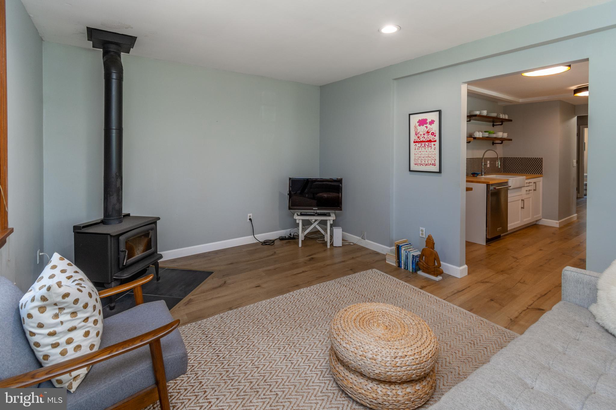 2539 Aquetong Road New Hope, PA 18938 - Photo 42 of 50 In-Law Suite Living Room w/Wood Stove
