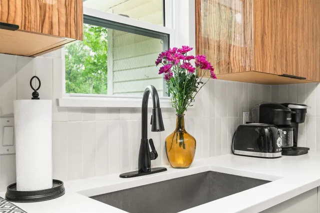 a vase of flowers sitting on a table