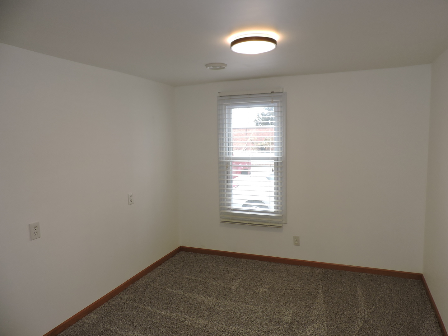 7749 79th Place Bridgeview, IL 60455 - Photo 12 of 19 an empty room with a window