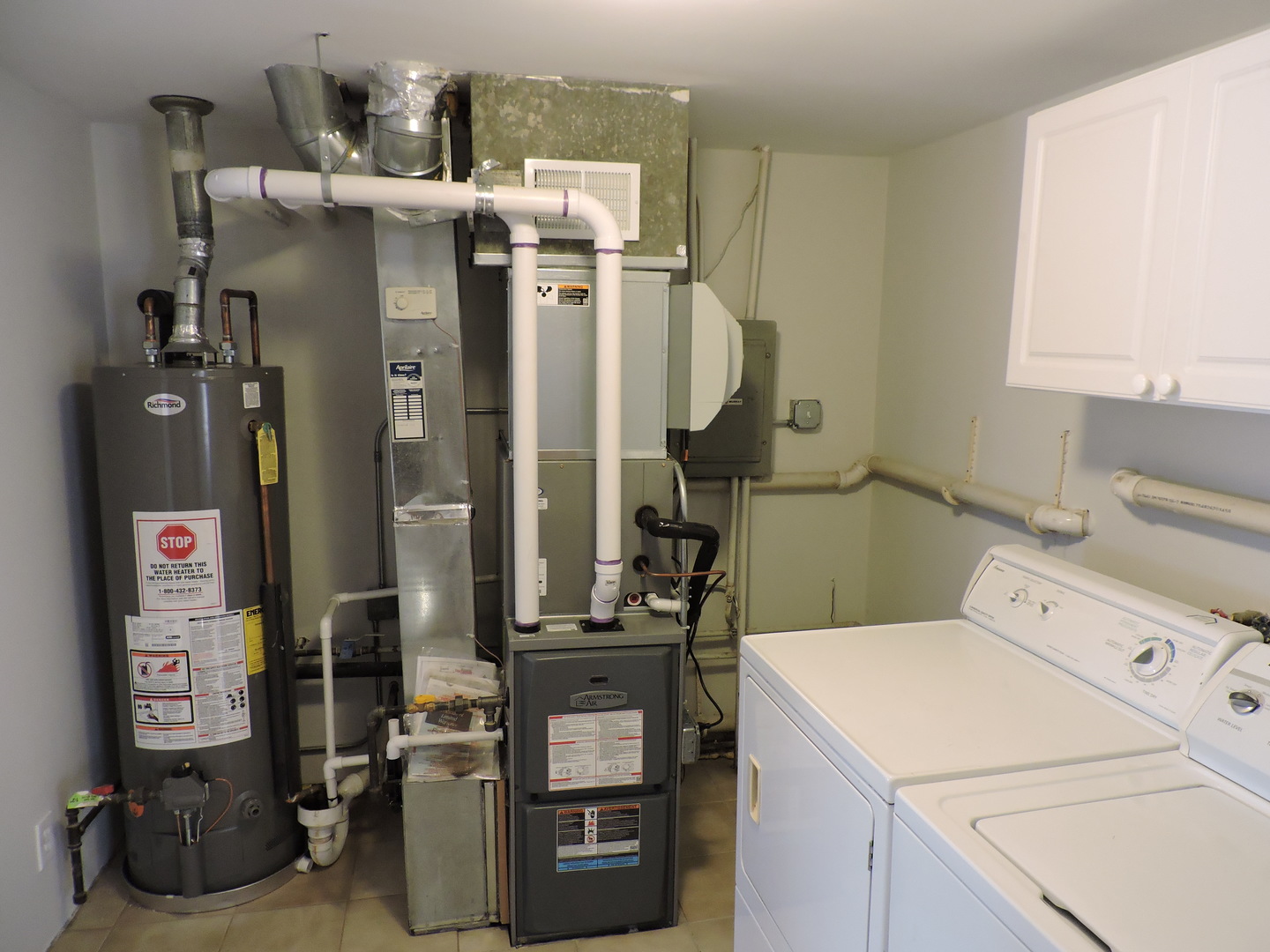 7749 79th Place Bridgeview, IL 60455 - Photo 14 of 19 a utility room with dryer and washer