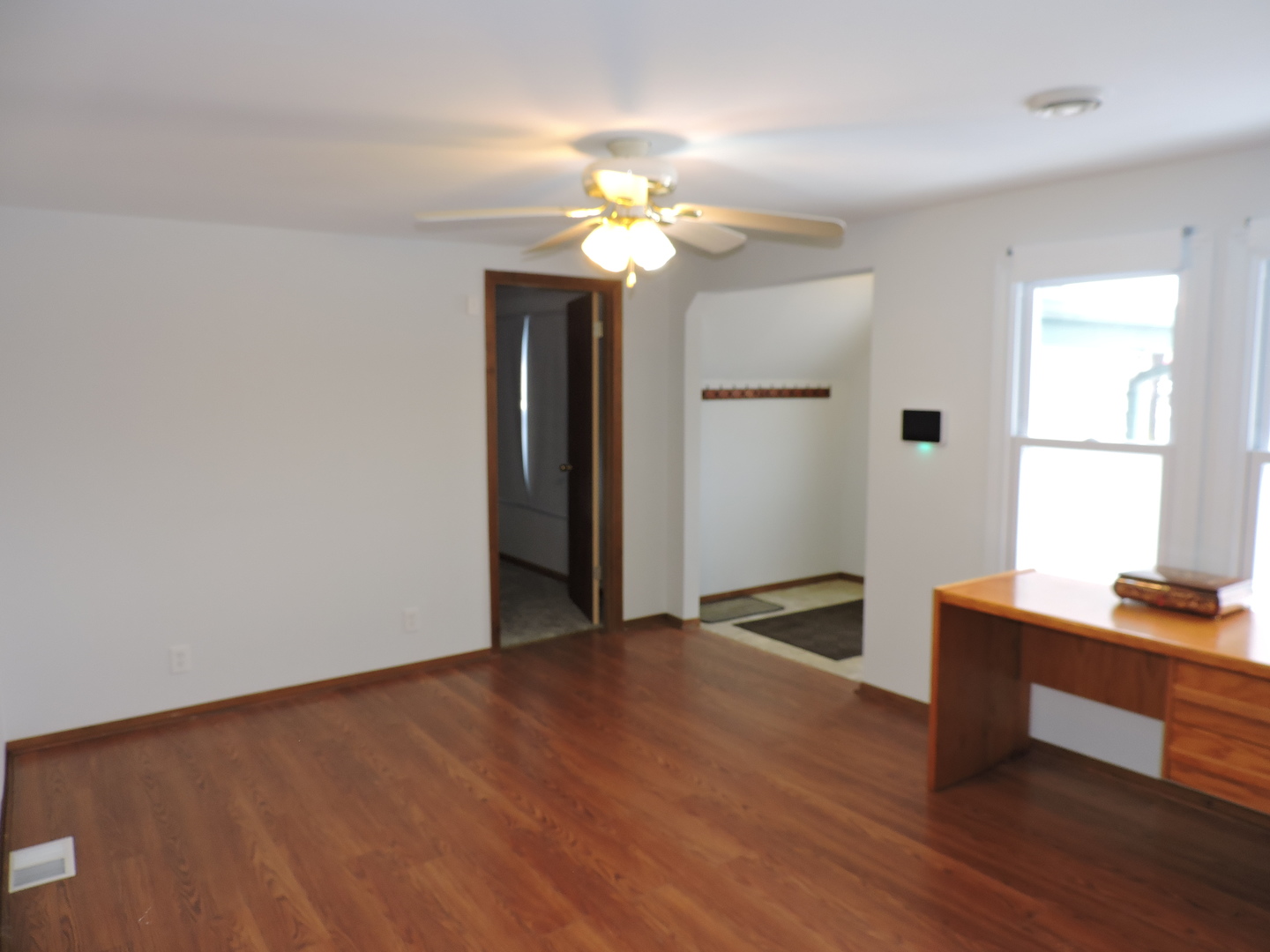 7749 79th Place Bridgeview, IL 60455 - Photo 6 of 19 a view of a livingroom with a chandelier furniture and a window