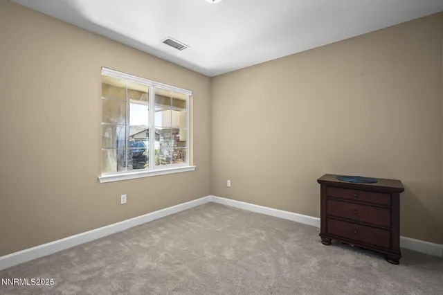 a room with a bed and a window