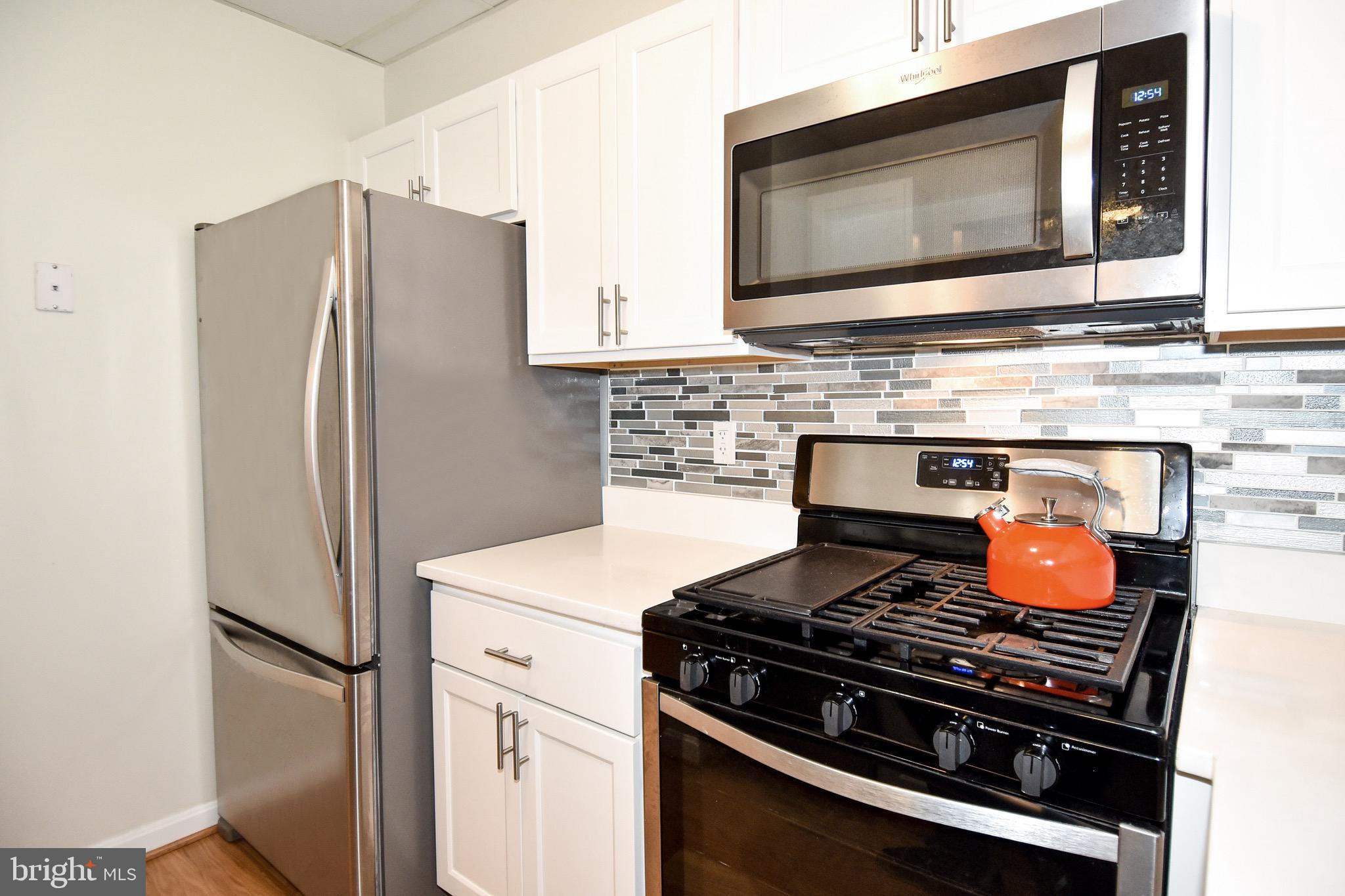 1927 Belmont Road Northwest, Unit 83 Washington, DC 20009 - Photo 15 of 27 New upgraded stainless steel appliances