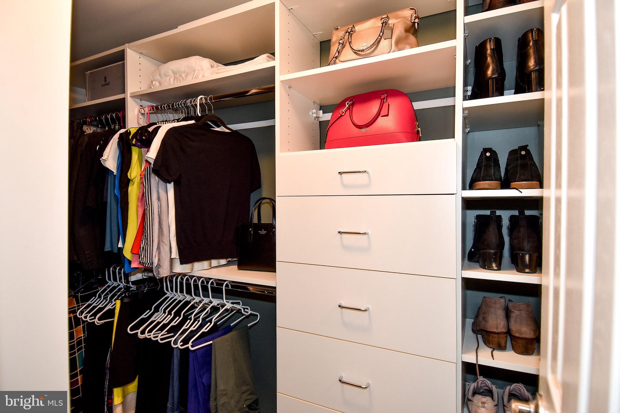 1927 Belmont Road Northwest, Unit 83 Washington, DC 20009 - Photo 17 of 27 MBR walk-in closet w/ custom built-ins