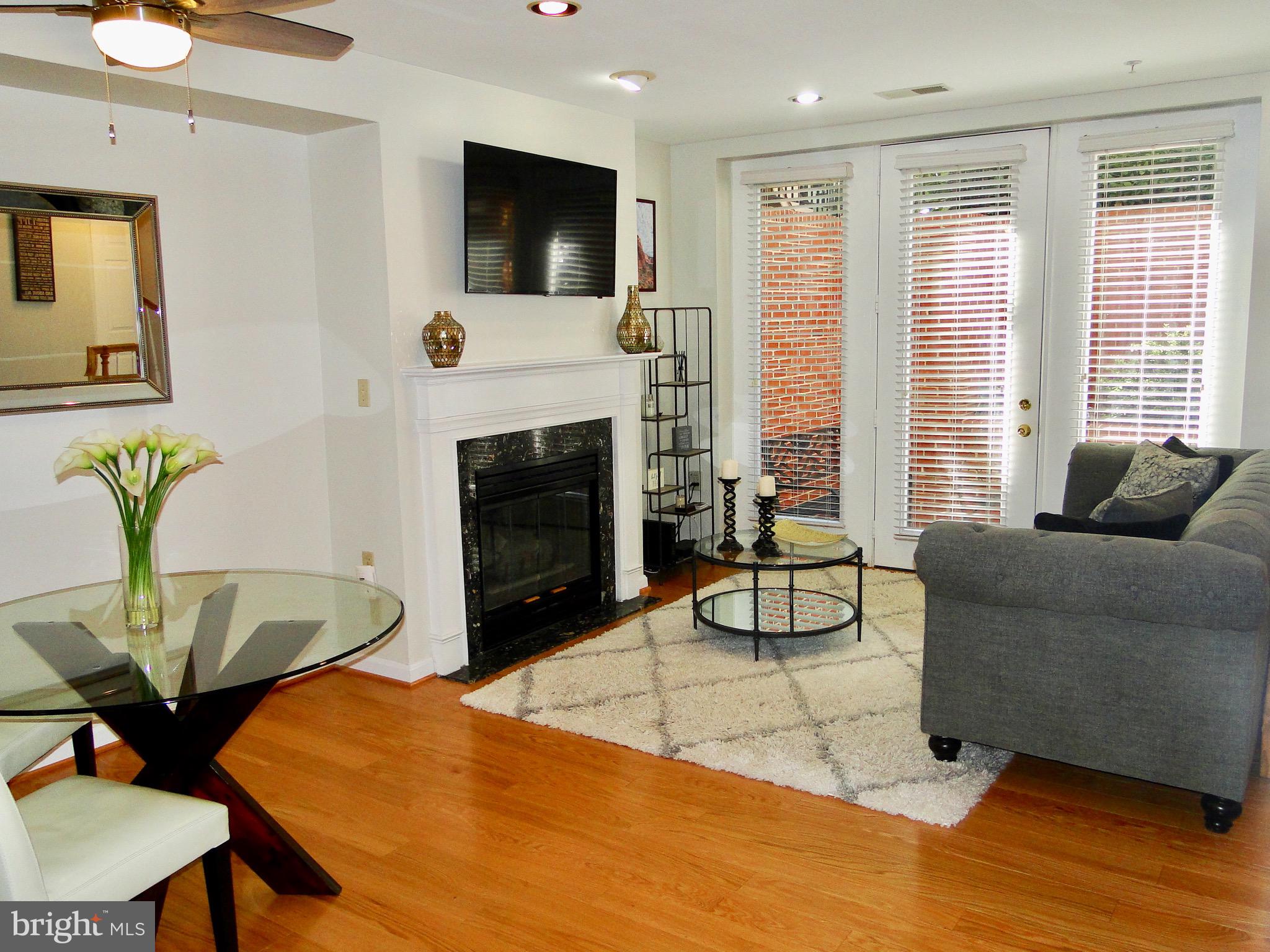 1927 Belmont Road Northwest, Unit 83 Washington, DC 20009 - Photo 10 of 27 Living room boasts hardwood floors