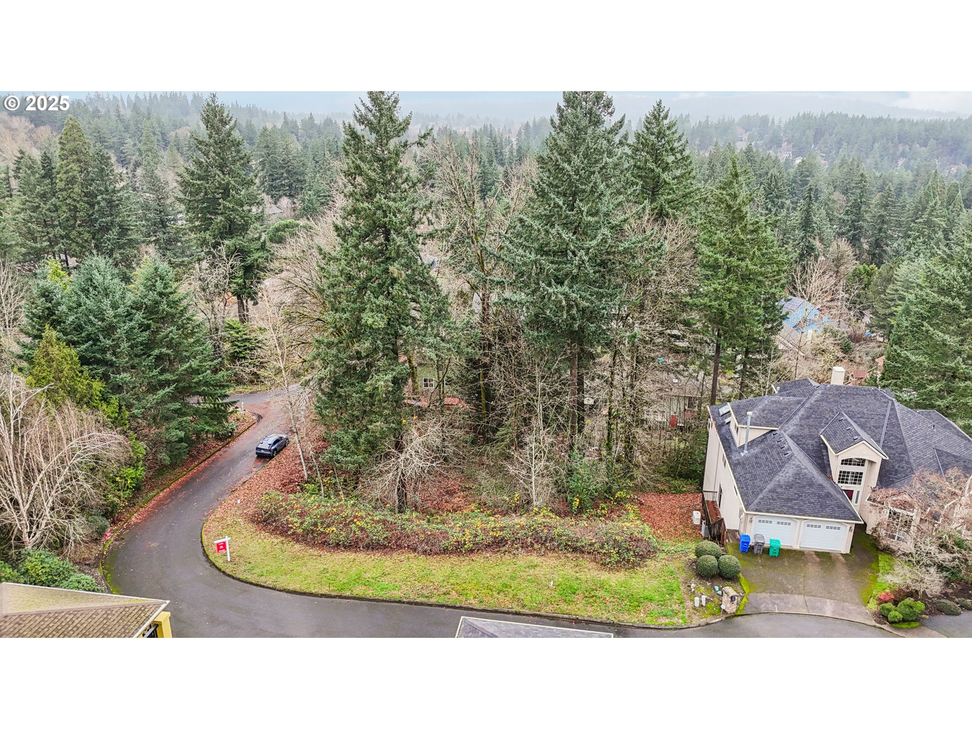 3317 Southwest Parsons Court Portland, OR 97219 - Photo 11 of 15 a view of a house with a yard