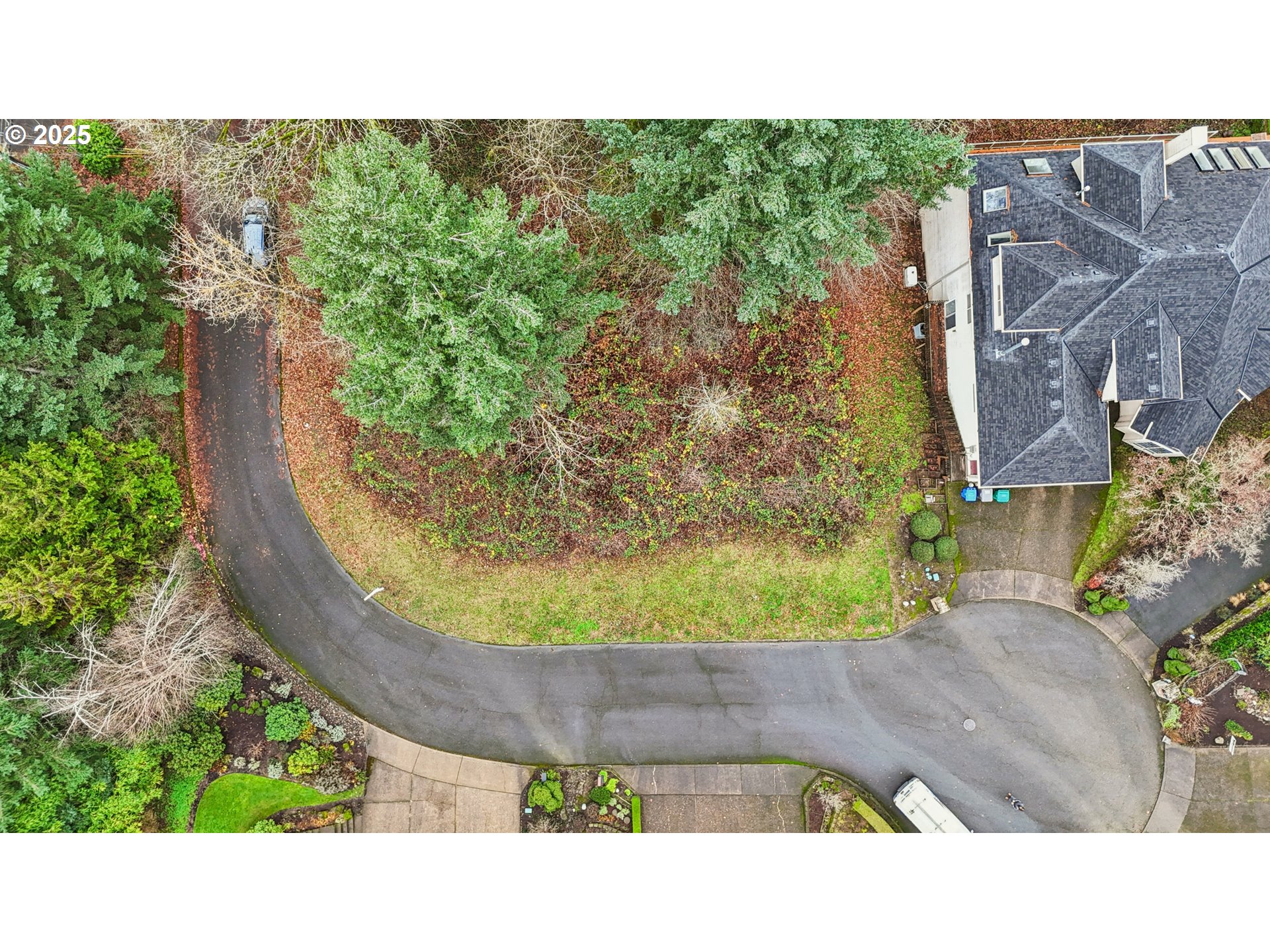 3317 Southwest Parsons Court Portland, OR 97219 - Photo 13 of 15 a black and white photo of a house