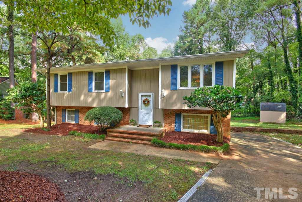7609 Rambeau Circle Raleigh, NC 27613 - Photo 2 of 22 front view of a house with a yard