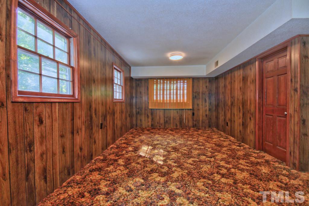 7609 Rambeau Circle Raleigh, NC 27613 - Photo 15 of 22 a view of an empty room with a window