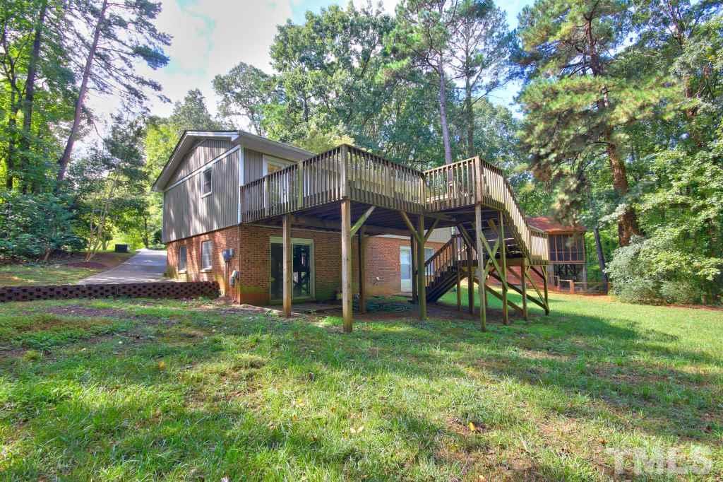 7609 Rambeau Circle Raleigh, NC 27613 - Photo 20 of 22 a view of a house with a yard and sitting area