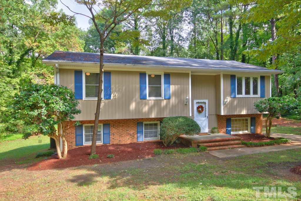7609 Rambeau Circle Raleigh, NC 27613 - Photo 3 of 22 a front view of a house with a yard