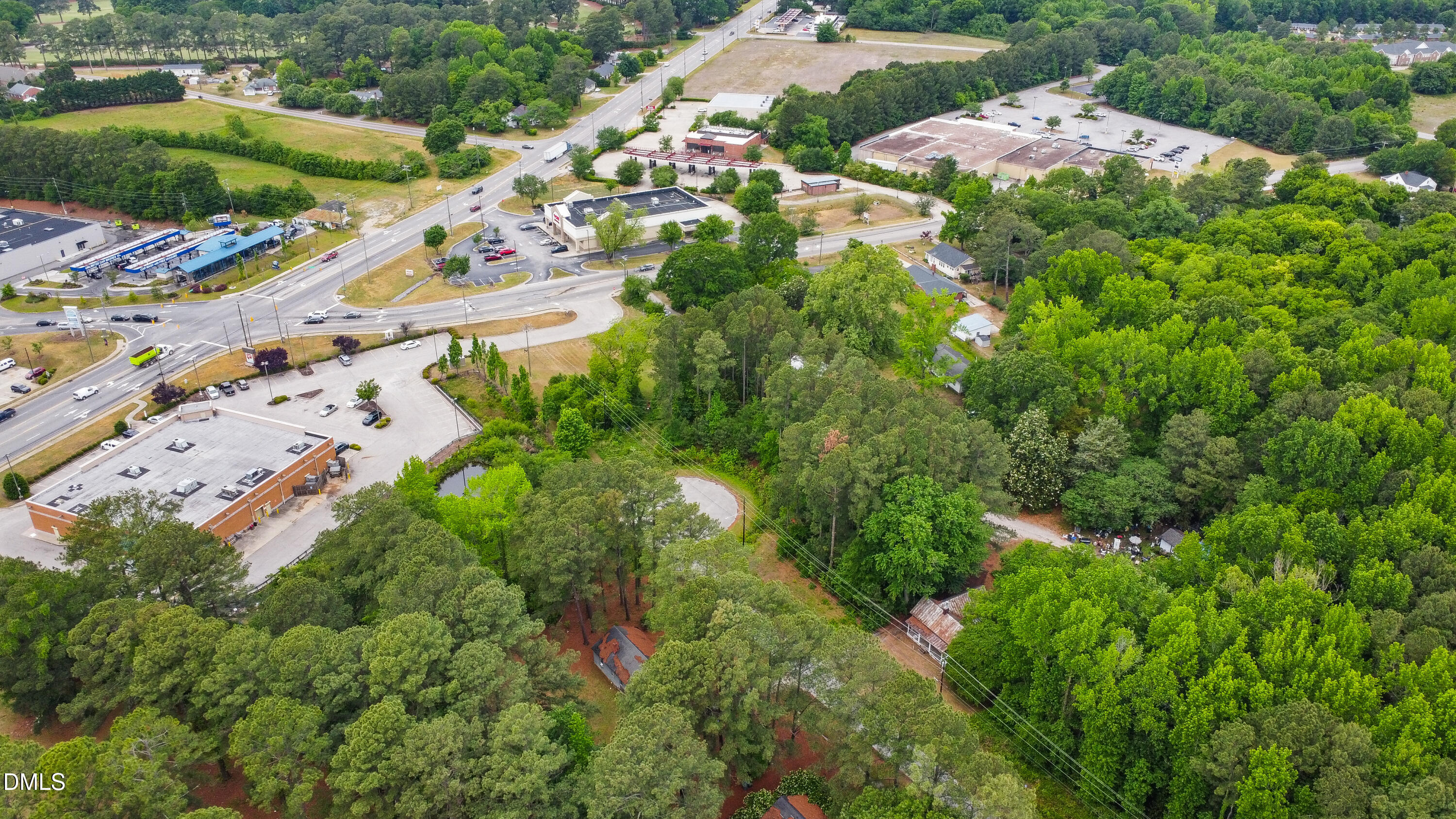 0 Goldrock Road Rocky Mount, NC 27804 - Photo 8 of 10 a backyard of a house with lots of green space
