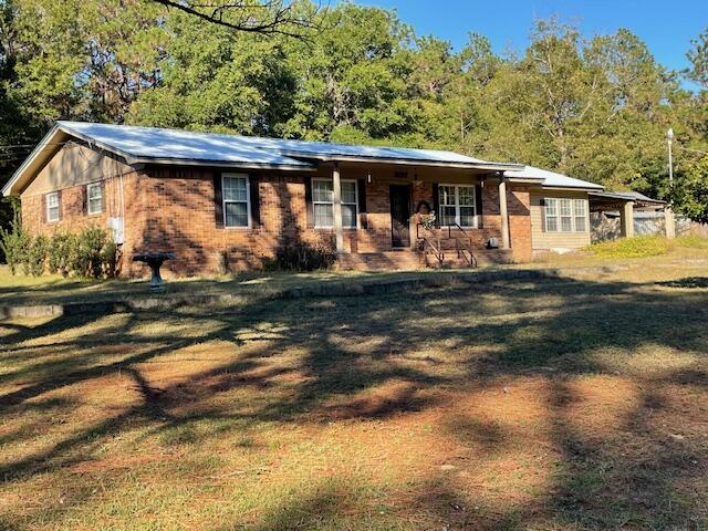 3107 Mayhair Road Crestview, FL 32539 - Photo 2 of 33 a front view of a house with garden