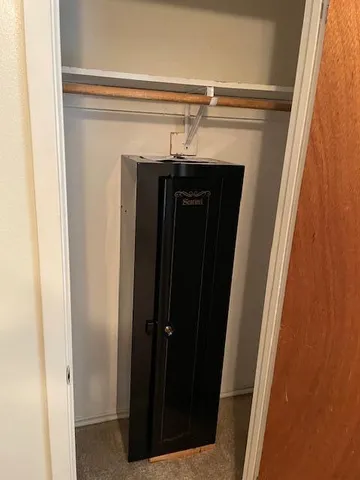 a bathroom with a toilet and a bathtub