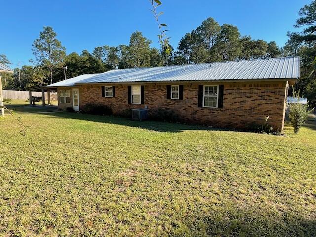 3107 Mayhair Road Crestview, FL 32539 - Photo 6 of 33 a front view of a house with yard and green space