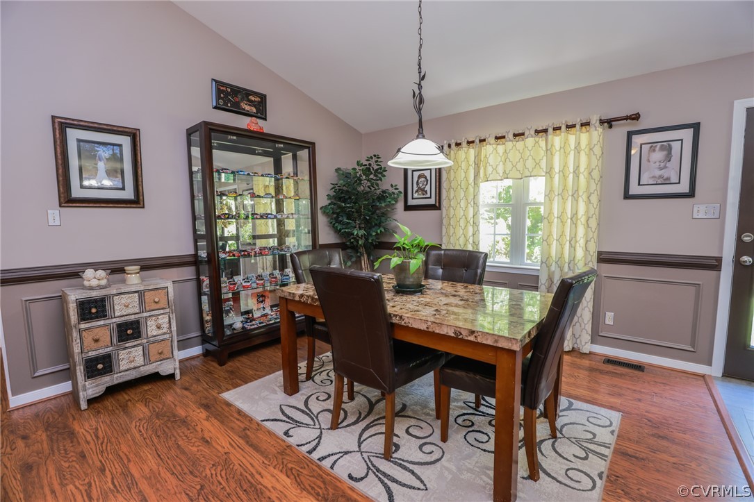 11706 Corte Castle Road Chesterfield, VA 23838 - Photo 20 of 44 a view of a dining room with furniture window and wooden floor