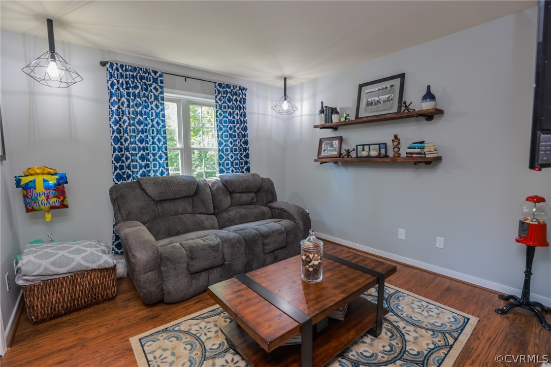 11706 Corte Castle Road Chesterfield, VA 23838 - Photo 27 of 44 a living room with furniture and a window