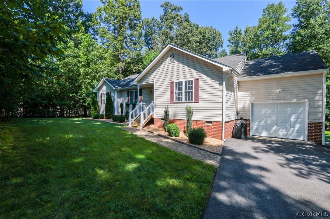 11706 Corte Castle Road Chesterfield, VA 23838 - Photo 3 of 44 a view of a house with a yard