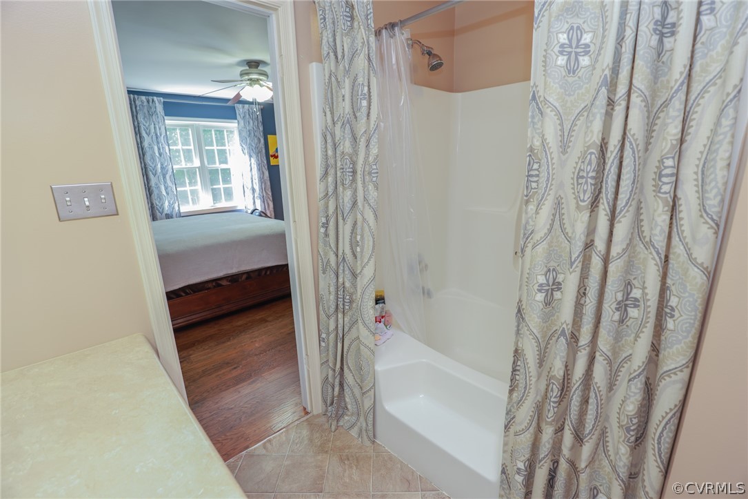 11706 Corte Castle Road Chesterfield, VA 23838 - Photo 33 of 44 a bathroom with a tub and shower