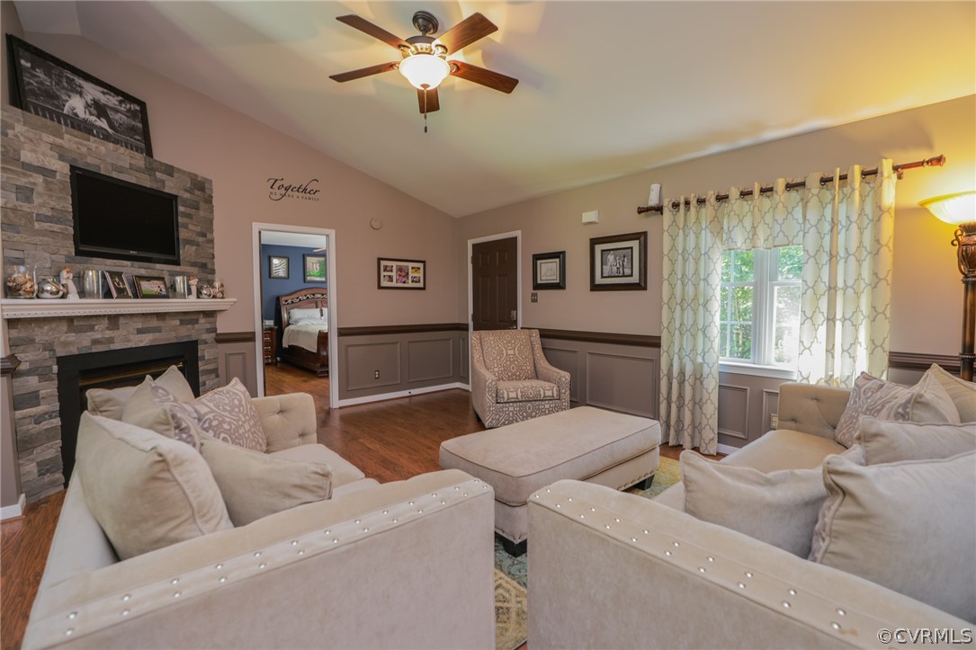 11706 Corte Castle Road Chesterfield, VA 23838 - Photo 7 of 44 a living room with furniture and a flat screen tv