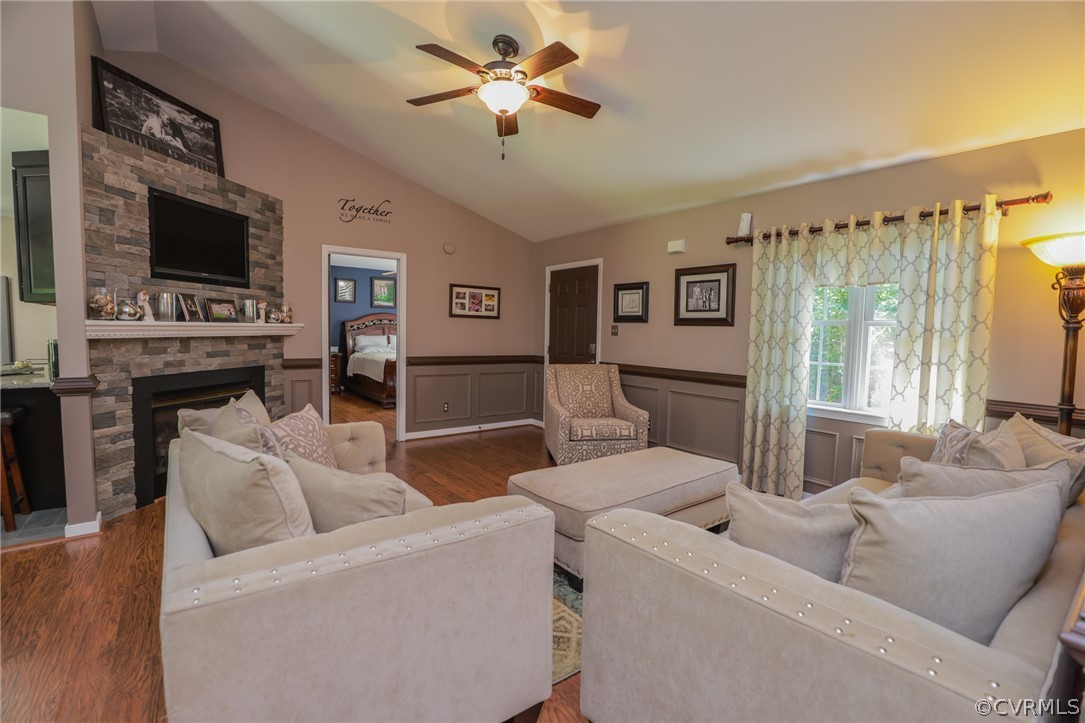 11706 Corte Castle Road Chesterfield, VA 23838 - Photo 8 of 44 a living room with furniture and a flat screen tv