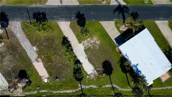 an aerial view of a house with a garden