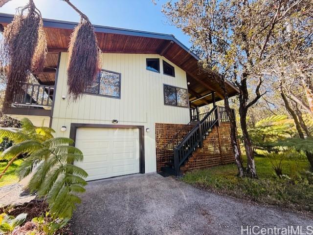 11-3763 10th Street Volcano, HI 96785 - Photo 1 of 1 a view of a house with a yard