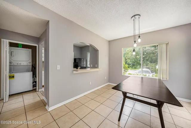 a bathroom with a sink a mirror and toilet
