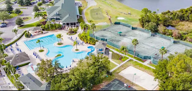 an aerial view of residential house with outdoor space