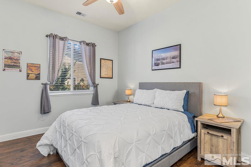 10589 Twin Bridges Way Reno, NV 89521 - Photo 20 of 34 a bedroom with a bed and window