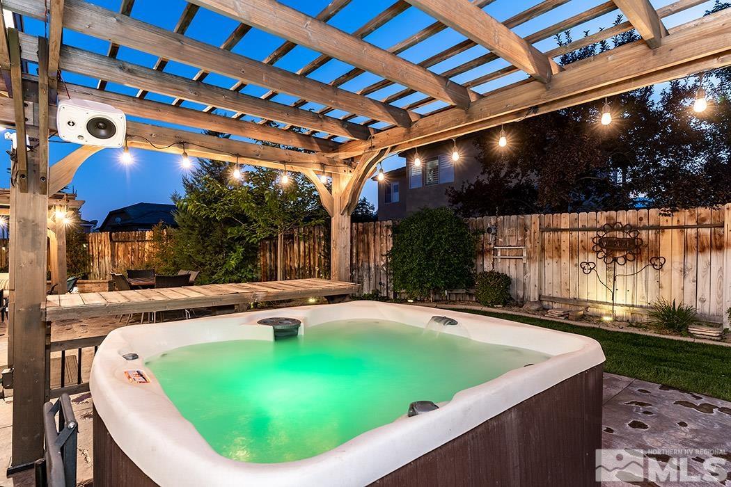 10589 Twin Bridges Way Reno, NV 89521 - Photo 26 of 34 a view of a swimming pool with a patio