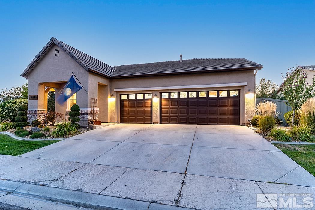 10589 Twin Bridges Way Reno, NV 89521 - Photo 3 of 34 a front view of house with yard and green space