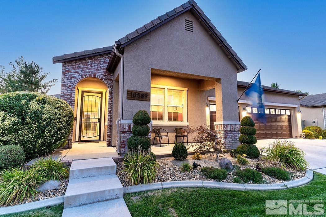 10589 Twin Bridges Way Reno, NV 89521 - Photo 6 of 34 a front view of house and yard with green space