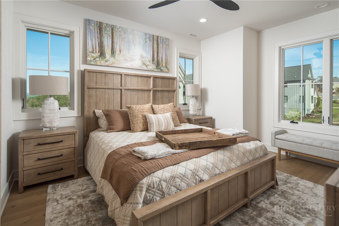 359 Calico Court Boone, NC 28607 - Photo 23 of 50 a bedroom with a bed and a window