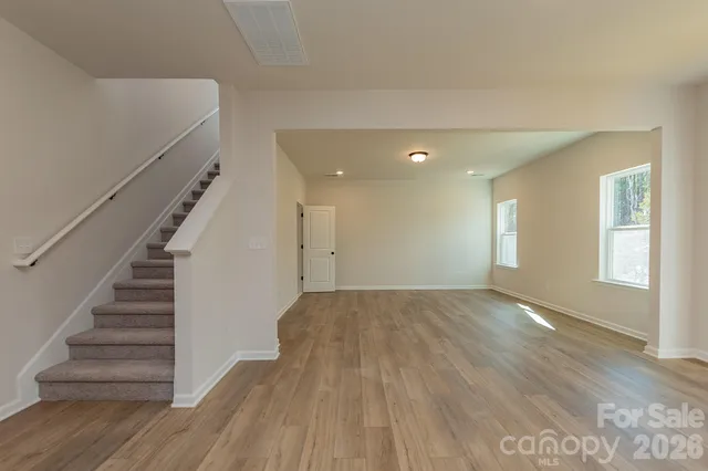 a view of a kitchen and a window