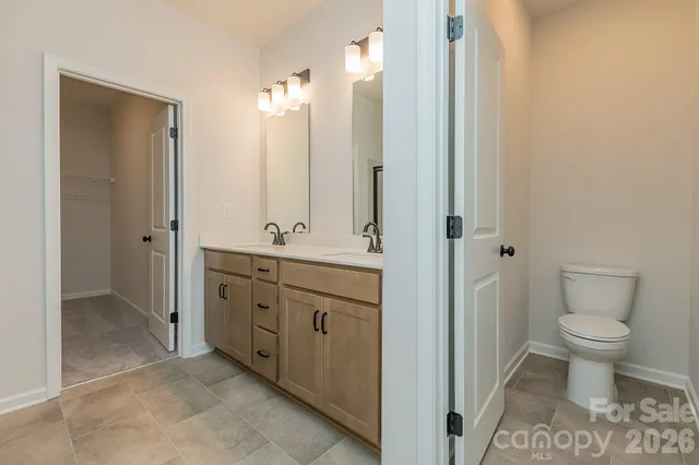 a view of a room with wooden walls