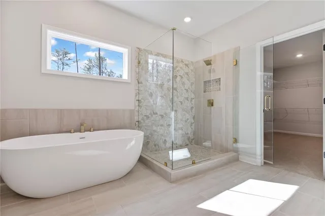 a bathroom with 2 sink and a mirror